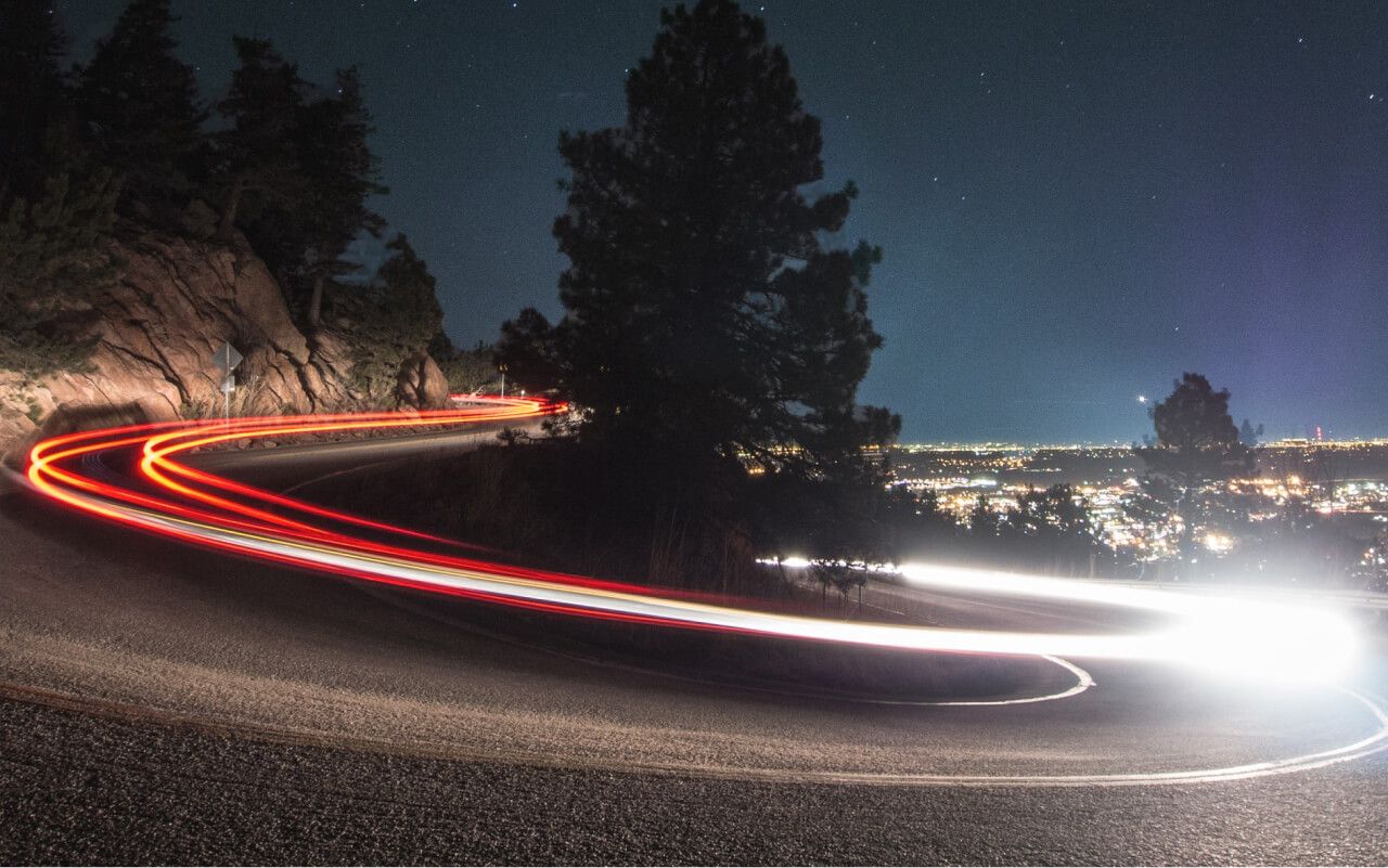 Car driving fast on the hill